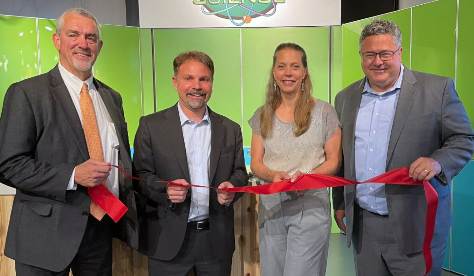 KBR celebrates the Landsat 9 ribbon cutting ceremony in Sioux Falls, SD. Featured from left to right: Bob Mundt, Sioux Falls Development Foundation; Dr. Peter Doucette, Acting USGS EROS Center Director; Cathy Richardson, NASA Deputy Director, Flight Projects Directorate; and Todd May, KBR Sr. Vice President, Science and Space. 