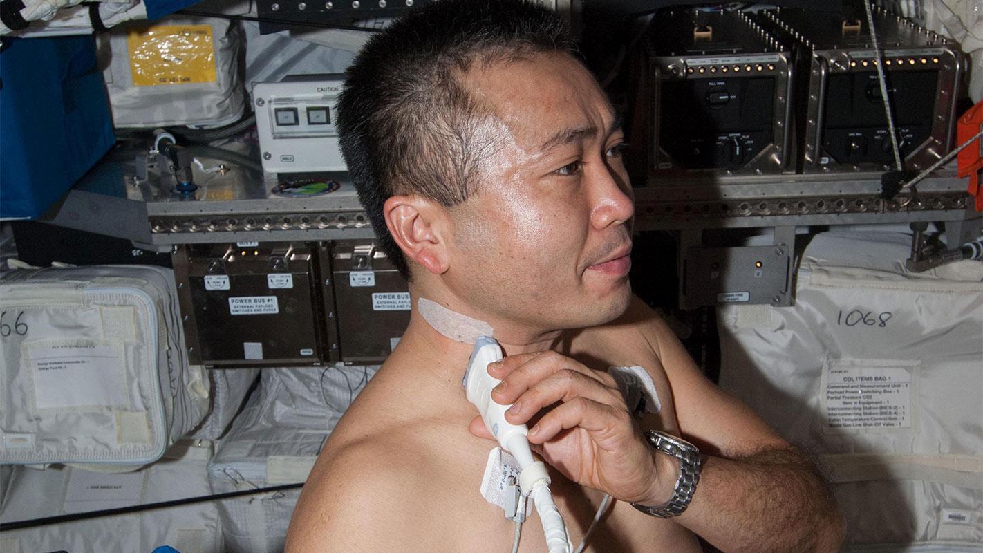 JAXA astronaut Koichi Wakata uses the ISS ultrasound to image his carotid artery.